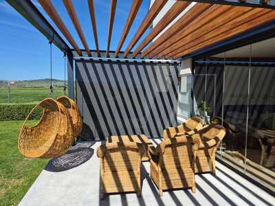 Patio roll-down blind installed